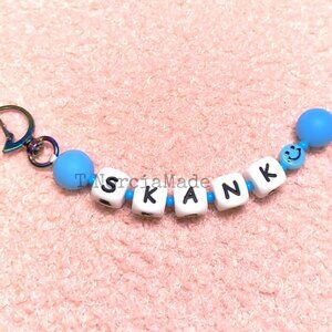 SK@NK: Silicone Offensive Keychain: Glow Light Blue